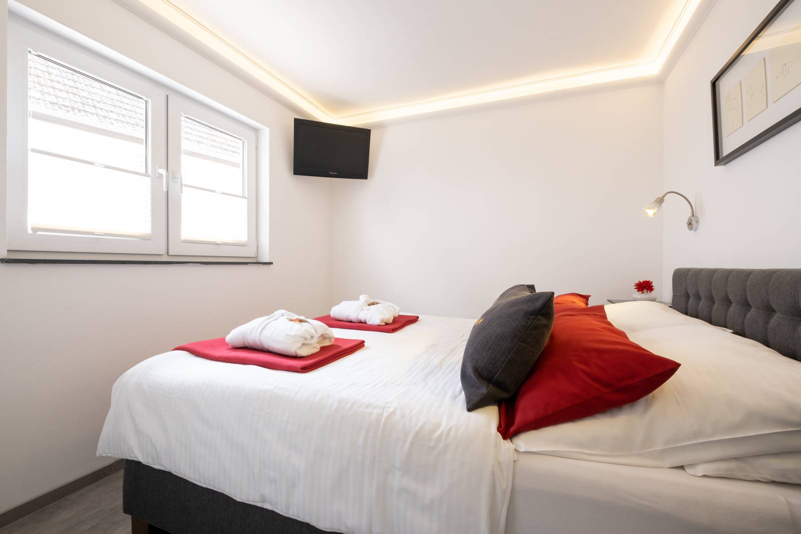 Schlafbereich mit Doppelbett der Ferienwohnung 2