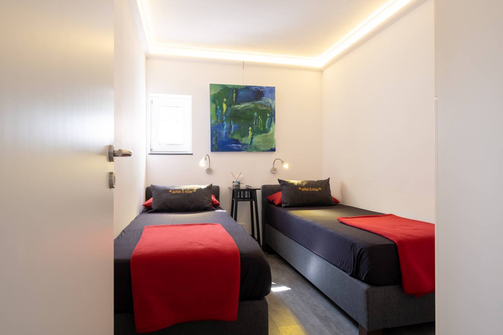 Schlafbereich mit zwei Einzelbetten der Ferienwohnung 2